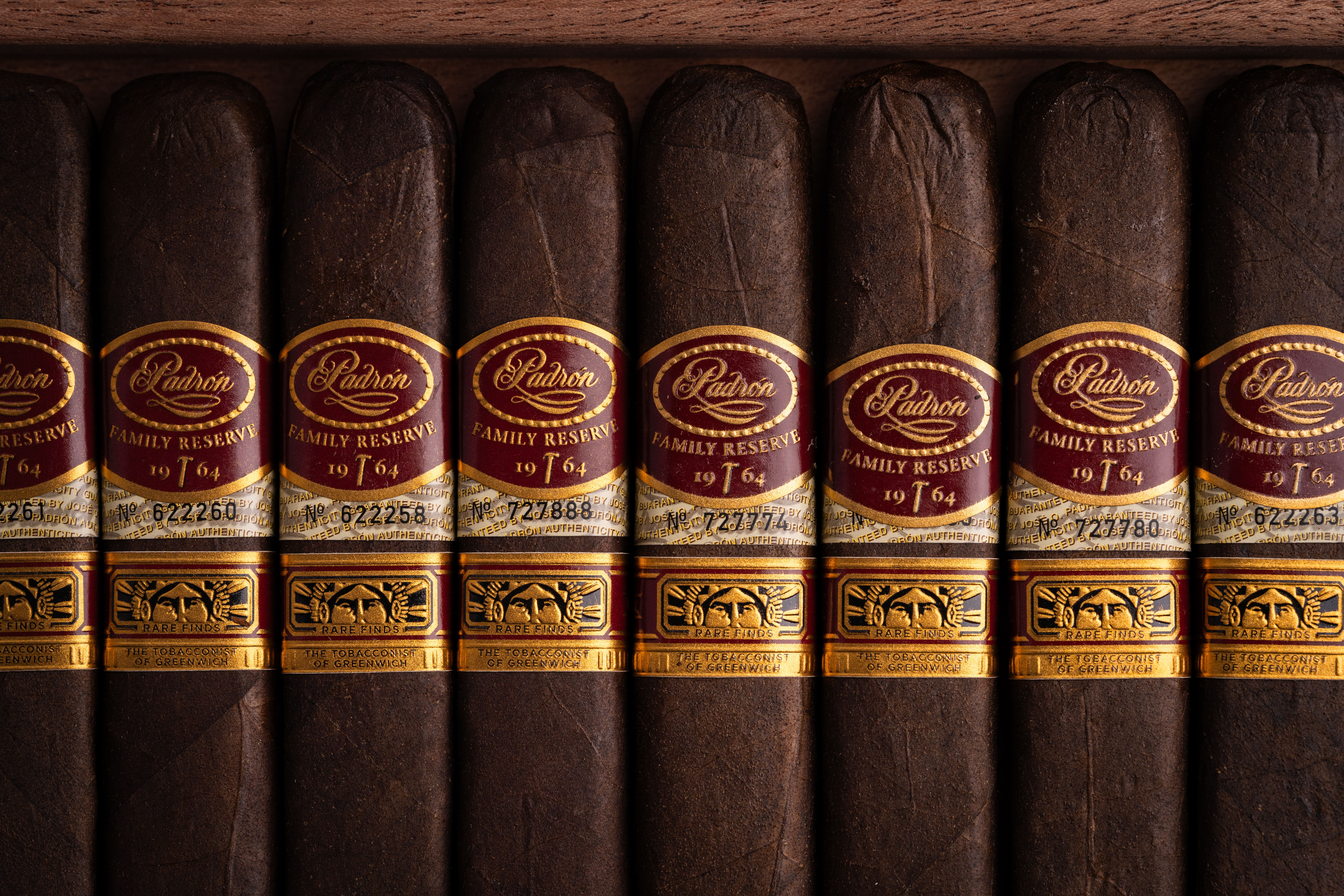 Padron Rare Finds A Hammer & A Dream Maduro cigars with gold bands and Tobacconist of Greenwich Logo
