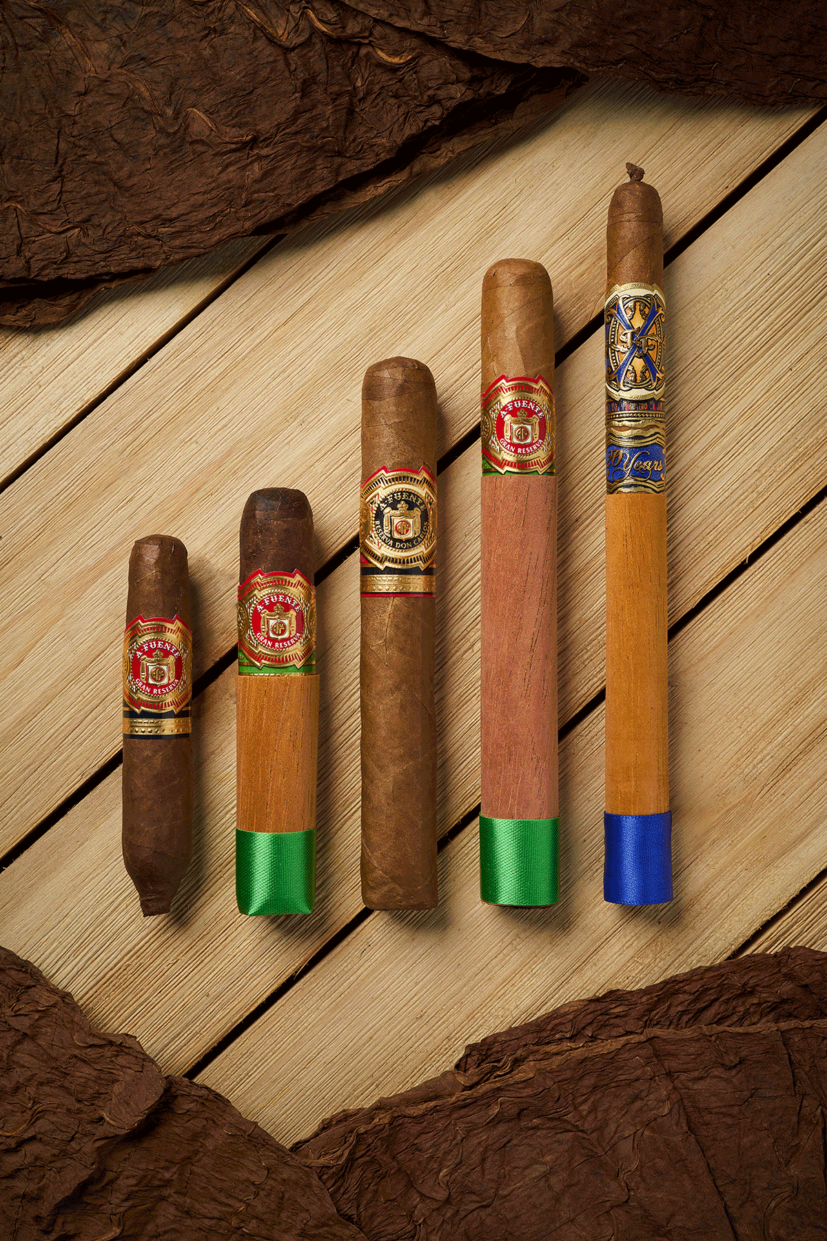 Image of the Opus X Phantom with other Arturo Fuente core cigars