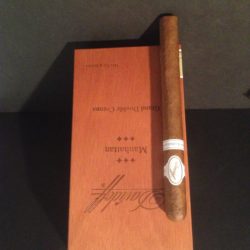 The davidoff Manhattan single cigar on closed cigar box