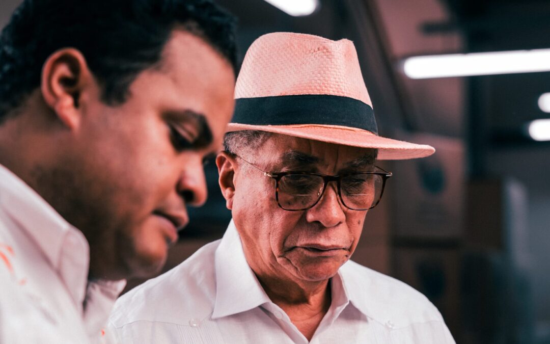 Master Blender Eladio Diaz of Tabacalera Diaz Cabrera works with his son Emmanuel.