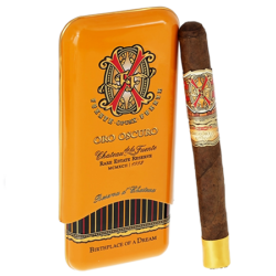 Opus X OXO Oro Oscuro Reserva d'Chateau tin of 3 Churchill cigars in elegant packaging.